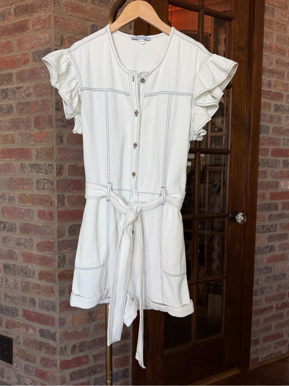 Off-white Ruffle-Sleeve Button Front Romper with Tie Waist by Kendall Lane